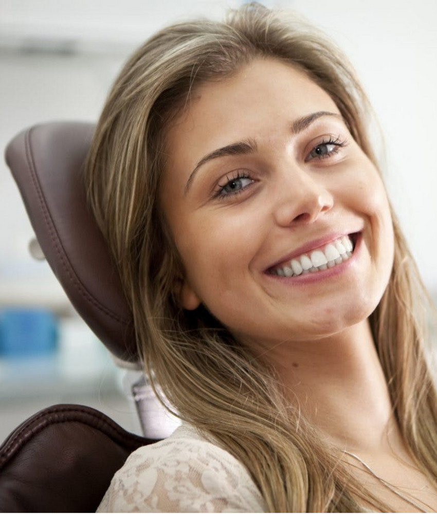 Patient smiling after a hygiene appointment